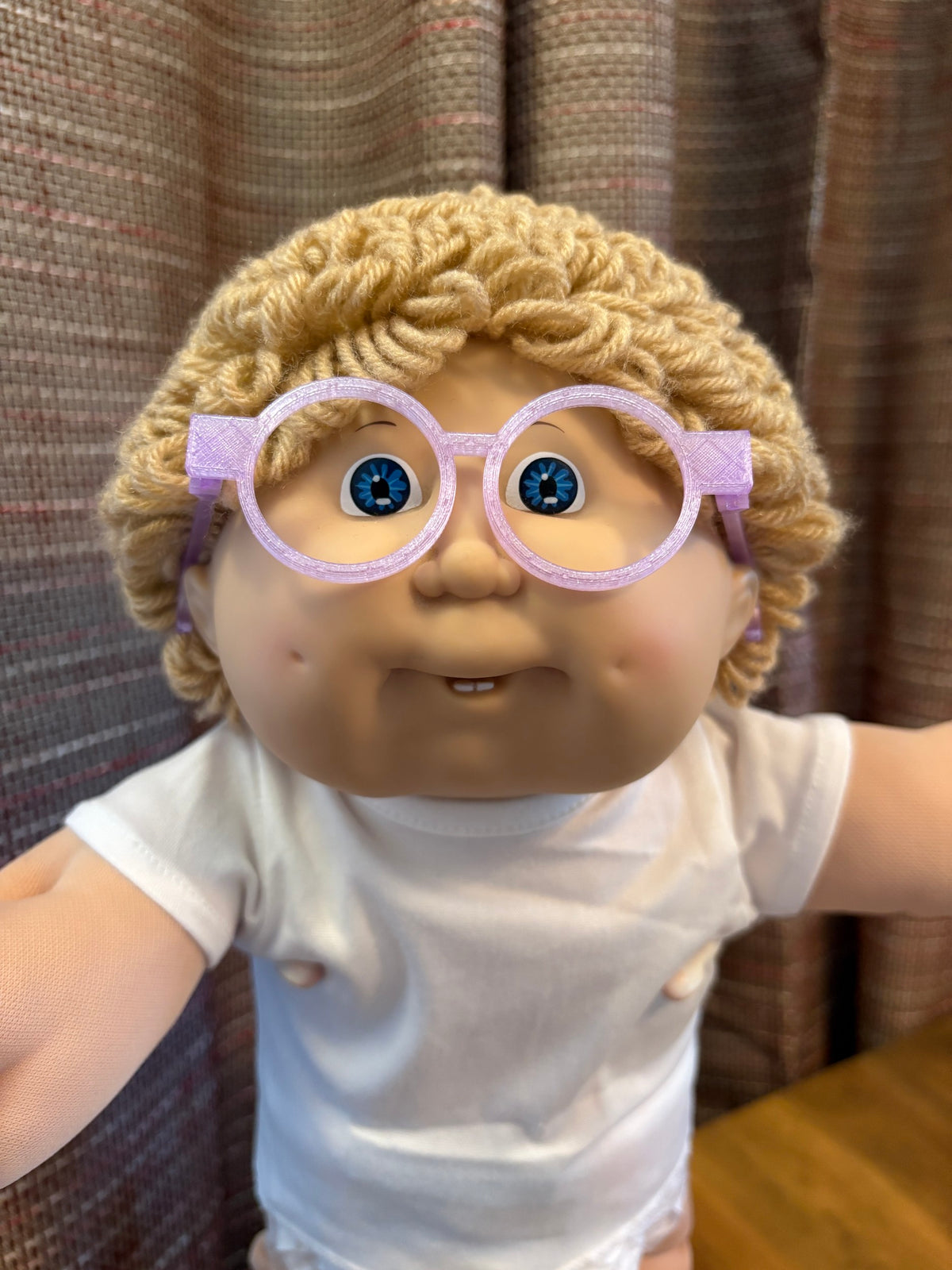 Purple round glasses on a 16 inch Cabbage Patch Kids doll
