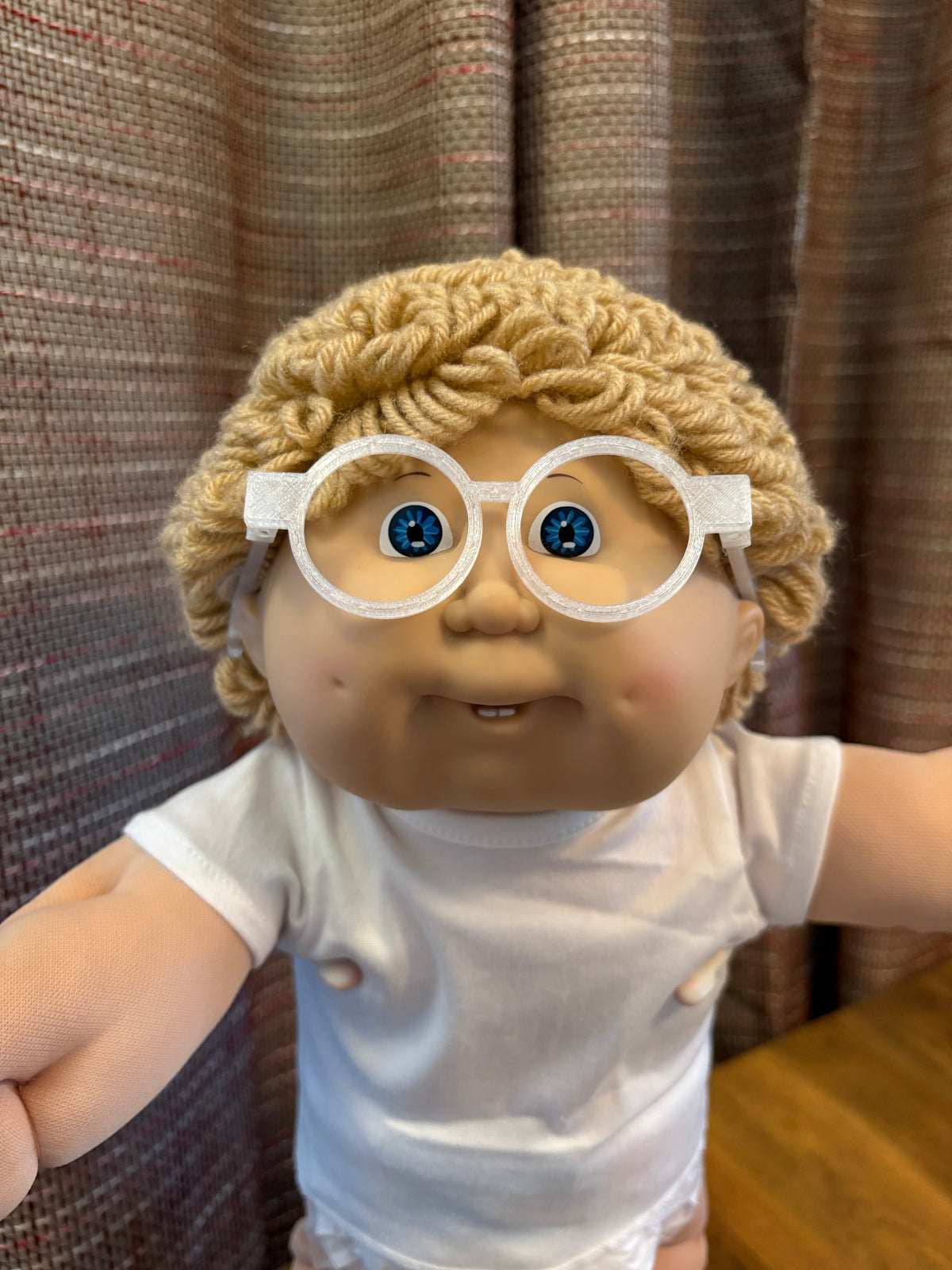 Clear round glasses on a 16 inch Cabbage Patch Kids doll