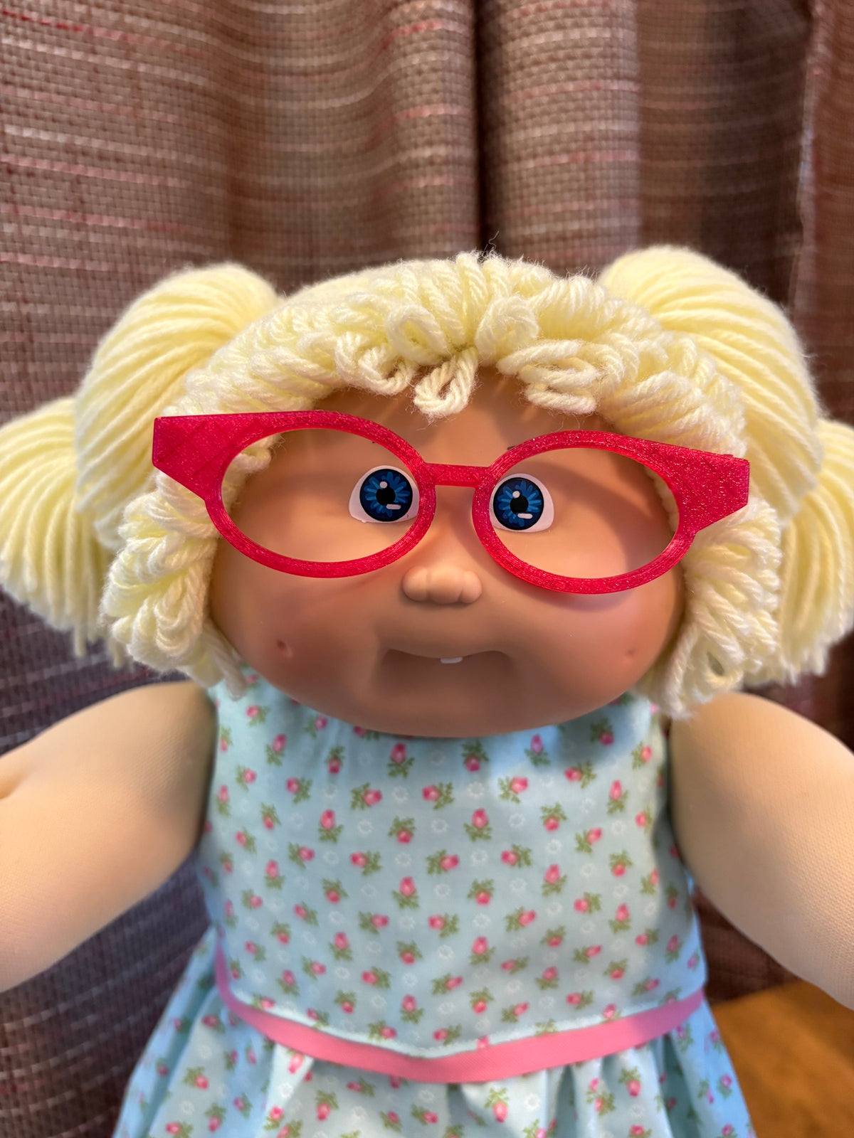 Red cat eye glasses on a 16 inch Cabbage Patch Kids doll