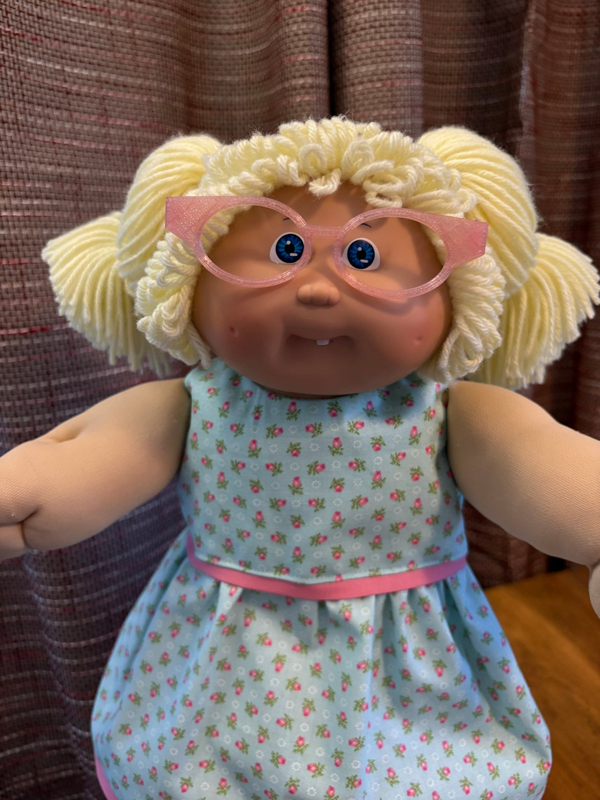 Pink cat eye glasses on a 16 inch Cabbage Patch Kids doll